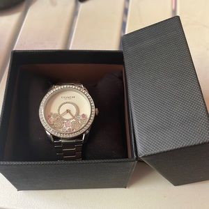 Woman’s coach watch. Never worn. New with box